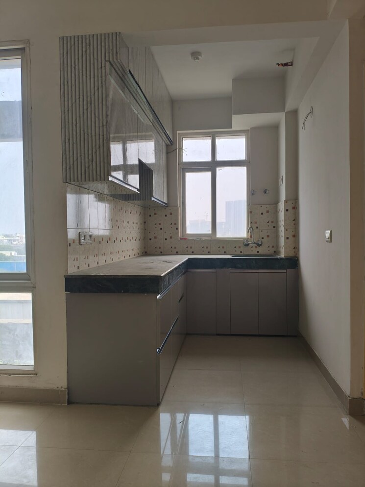 Kitchen, pareena-om-apartments 2 Bedroom 671 Sq.Ft. Apartment In Sector 112 Gurgaon 9387725
