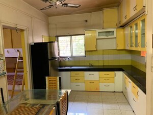 Kitchen in 2 BHK Apartment at Associated Sai Smruti, Dahanukar Colony – for Rent