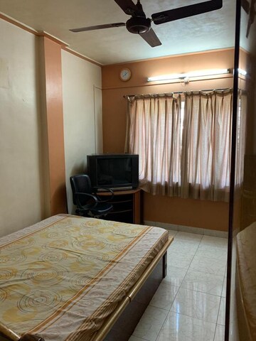 Bedroom in 2 BHK Apartment at Associated Sai Smruti, Dahanukar Colony – for Rent