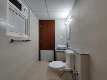 Bathroom in 3 BHK Apartment at Bhartiya Nikoo Homes Phase 2, Thanisandra Main Road – for Rent