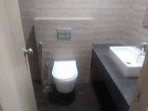 Bathroom in 4 BHK Apartment at Rajesh Raj Infinia, Malad West – for Sale