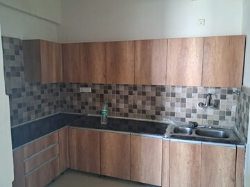 Kitchen in 2.5 BHK Apartment at Prateek Grand City, Siddharth Vihar – for Rent