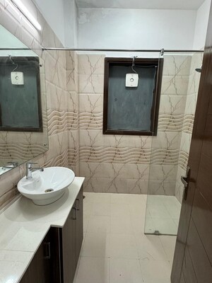 Bathroom in 4 BHK Builder Floor at Ansal Sushant Shopping Arcade, Sector 27 – for Rent