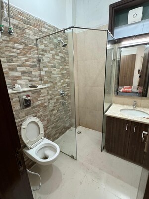 Bathroom in 4 BHK Builder Floor at Ansal Sushant Shopping Arcade, Sector 27 – for Rent
