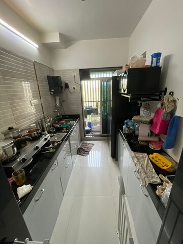 Kitchen in 1 BHK Apartment at Goodwill Olive Residency, Owale – for Sale