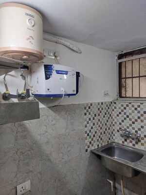 Bathroom in 1.5 BHK Builder Floor at East Of Kailash – for Rent