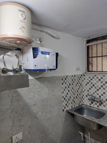 Bathroom in 1.5 BHK Builder Floor at East Of Kailash – for Rent
