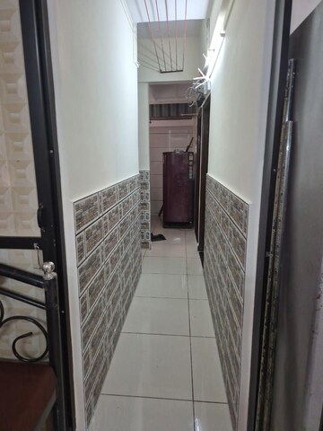 Building Lobby in 2 BHK Apartment at Kopar Khairane – for Sale
