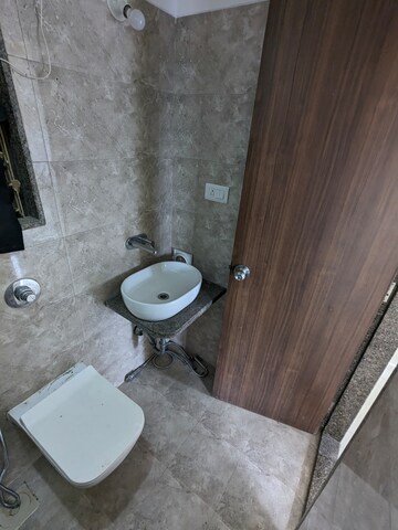 Bathroom in 1 BHK Apartment at Parinee Essence, Kandivali West – for Sale