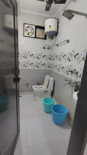 Bathroom in 3 BHK Builder Floor at Dwarka Mor – for Rent