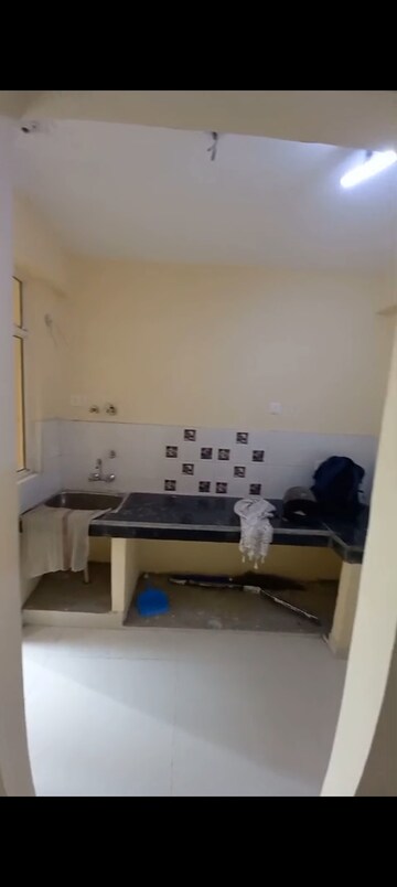 Kitchen in 2 BHK Apartment at Eureka Diya Green City, Raj Nagar Extension – for Rent