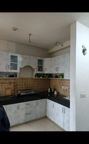 Kitchen in 2 BHK Apartment at Mahagun Mywoods, Sector 16c Greater Noida – for Rent