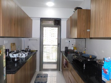 Kitchen in 3 BHK Apartment at Lodha Splendora, Ghodbunder Road – for Sale