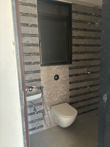 Bathroom in 2 BHK Apartment at Neminath Ekta Suprabhat, Motilal Nagar – for Rent