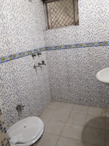 Bathroom in 2 BHK Apartment at Vivekanand Apartments, Rohini Sector 8 – for Rent