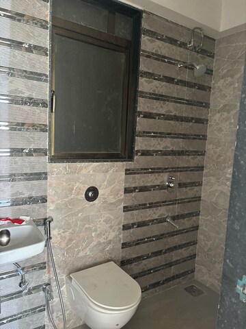 Bathroom in 1 BHK Apartment at Neminath Ekta Suprabhat, Motilal Nagar – for Rent