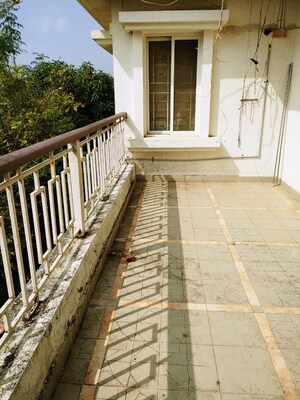 Balcony in 1 BHK Apartment at Forest Trails Cascade And Crescent, Bhugaon – for Rent