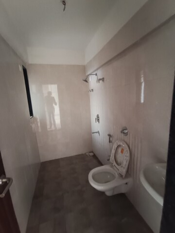 Bathroom in 1 BHK Apartment at Yogi Ajmera Bliss, Kalyan West – for Sale