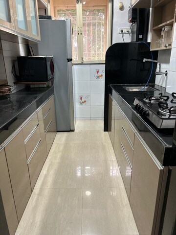 Kitchen in 1 BHK Apartment at Thakur Gayatri Satsang, Kandivali East – for Rent
