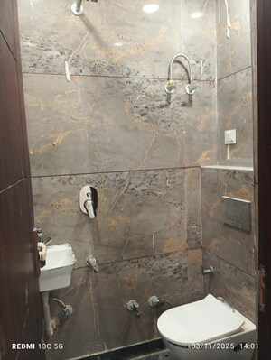 Bathroom in 3 BHK Builder Floor at Rohini Sector 25 – for Sale