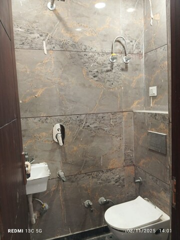 Bathroom in 3 BHK Builder Floor at Rohini Sector 25 – for Sale
