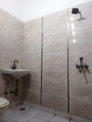Bathroom in 4 BHK Builder Floor at Shakti Khand iv – for Rent