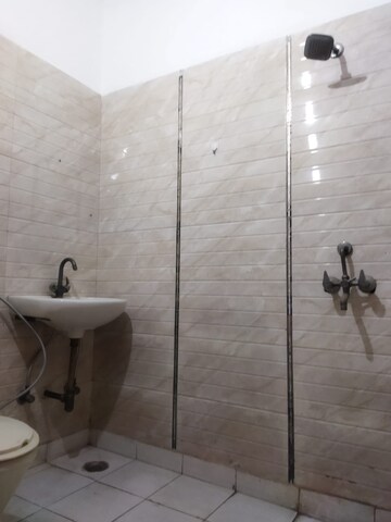 Bathroom in 4 BHK Builder Floor at Shakti Khand iv – for Rent