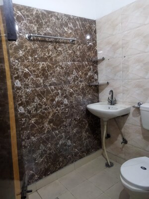 Bathroom in 4 BHK Builder Floor at Shakti Khand iv – for Rent