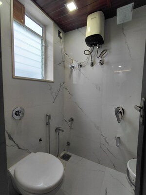 Bathroom in 1 BHK Apartment at Kalpataru Shravasti, Malad West – for Rent