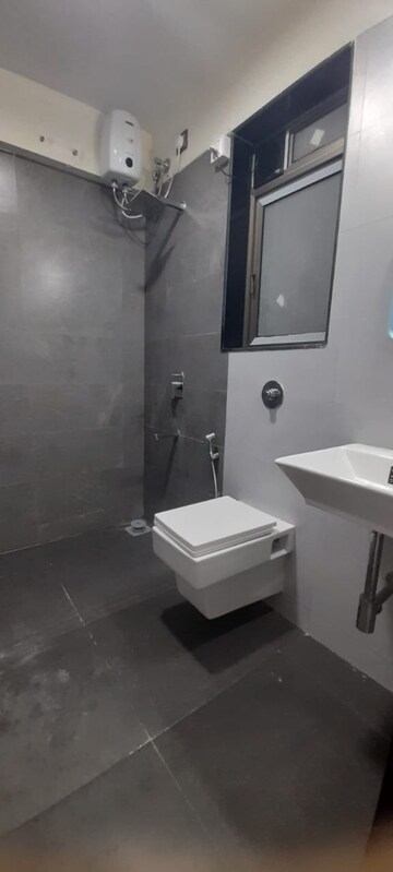 Bathroom in 4 BHK Apartment at Omkar Alta Monte, Malad East – for Rent