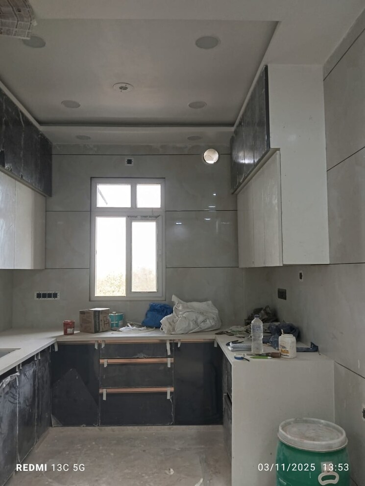 Kitchen, rohini sector 25 3 Bedroom 78 Sq.Mt. Builder Floor In Rohini Sector 25 Delhi 9389059