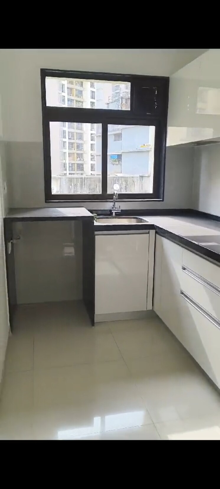 Kitchen, lalani-velentine-apartment-1-wing-d 1 Bedroom 405 Sq.Ft. Apartment In Malad East Mumbai 9389131