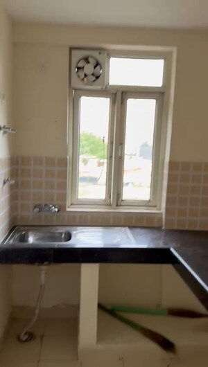 Kitchen in 2 BHK Apartment at Shree Vardhman Mantra, Sector 67 – for Rent