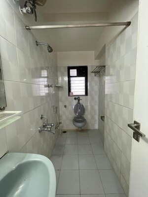 Bathroom in 1 BHK Apartment at Juhu Abhishek Chs Ltd, Andheri West – for Sale