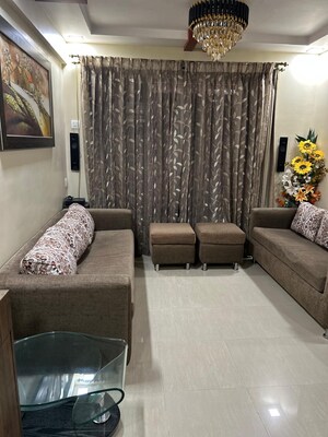 Living Room in 4 BHK Apartment at Raheja Odyssey, Kandivali East – for Sale