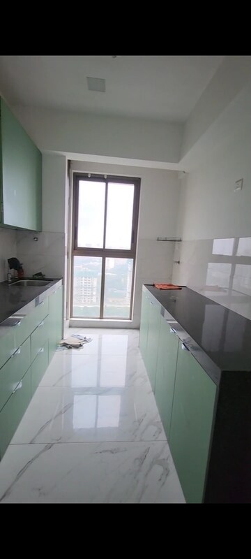 Kitchen in 2 BHK Apartment at Raymond Ten X Habitat, Pokhran Road No Two – for Rent