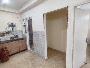 Kitchen in 2 BHK Apartment at Gaur Yamuna City, Gaur Yamuna City – for Rent