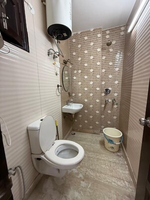 Bathroom in 2 BHK Builder Floor at Paschim Vihar – for Rent