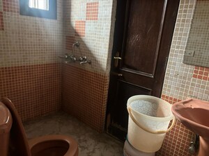 Bathroom in 4 BHK Apartment at Shiwalik Greens, Dhakoli – for Sale