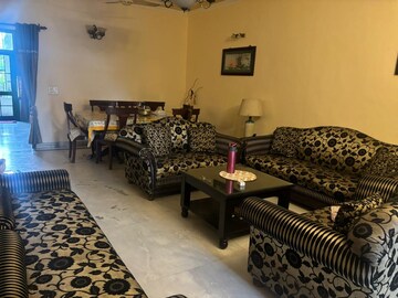 Living Room in 4 BHK Apartment at Shiwalik Greens, Dhakoli – for Sale