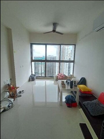 Living Room in 1 BHK Apartment at Lodha Casa Viva, Majiwada – for Rent