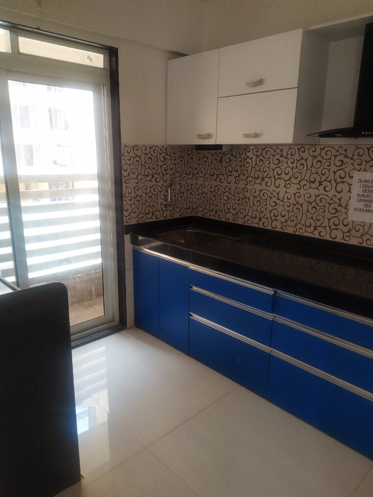Kitchen, cosmos-enclave 2 Bedroom 740 Sq.Ft. Apartment In Kasarvadavali Thane 9389654