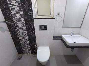 Bathroom in 2 BHK Apartment at Omkar Ananta, Goregaon East – for Rent