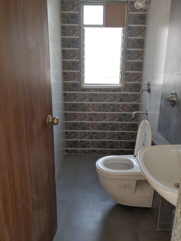 Bathroom in 3 BHK Apartment at Axis Paradigm Whistling Meadows, Paud Road – for Rent