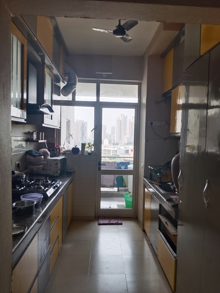 Kitchen, vatika-gurgaon-21 3 Bedroom 1733 Sq.Ft. Apartment In Sector 83 Gurgaon 9389780