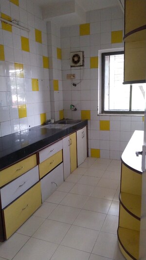 Kitchen in 2 BHK Apartment at K Raheja Woods, Kalyani Nagar – for Rent