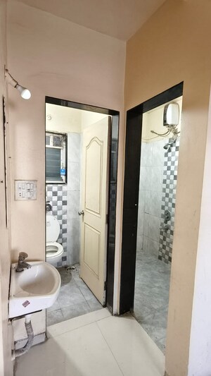 Bathroom in 1 BHK Apartment at Wadgaon Sheri – for Rent