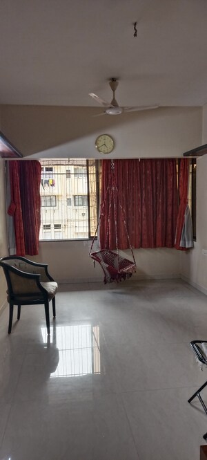 Living Room in 1 BHK Apartment at Neel Varsha Apartment, Mahim – for Rent