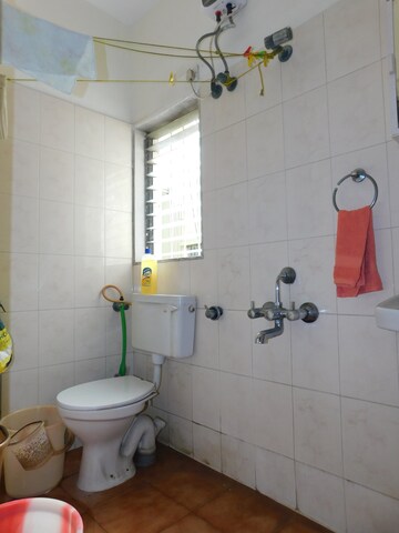 Bathroom in 2 BHK Apartment at Chincholi Apartment, Malad West – for Sale
