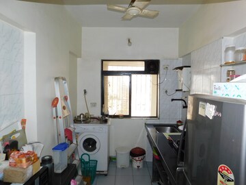 Kitchen in 2 BHK Apartment at Chincholi Apartment, Malad West – for Sale